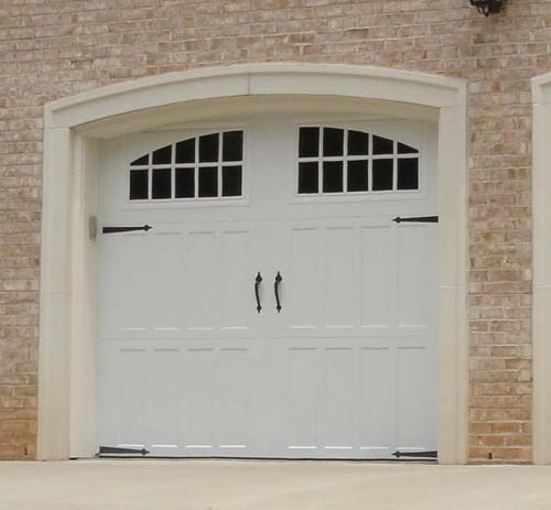 Steel Carriage house garage door installation in VA by Academy Door 
